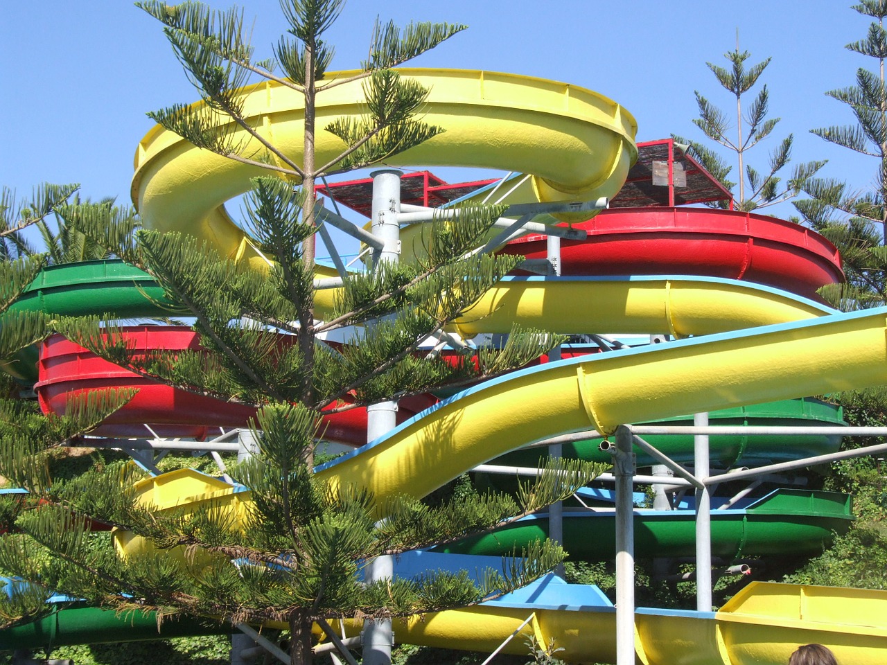 Waterslides weaving around pine trees at Waterville USA