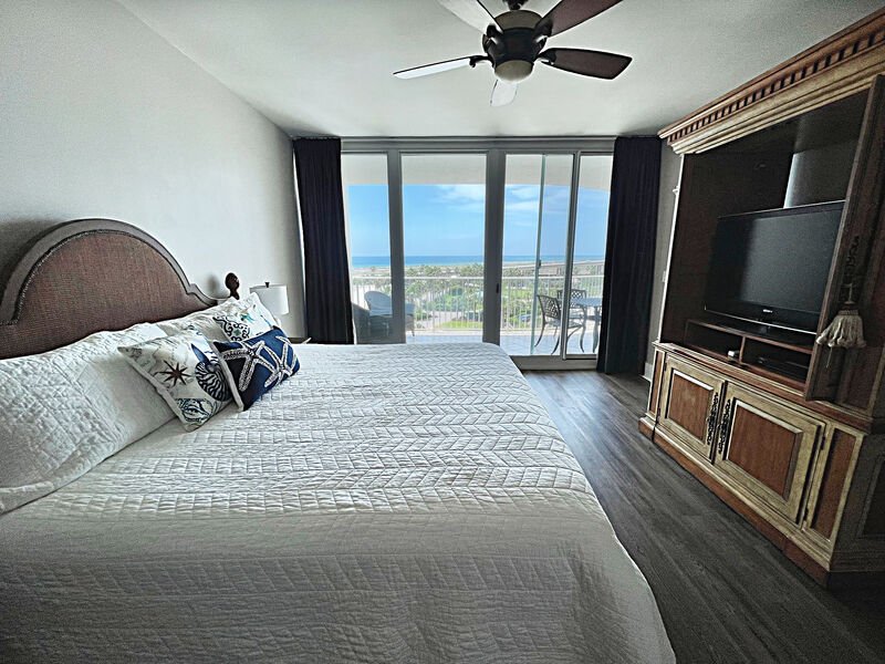 The bedroom of a beachfront condo in Orange Beach AL