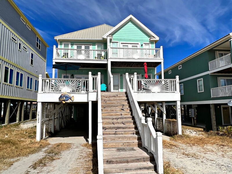 The exterior view of one of our Airbnbs in Gulf Shores on the Beach