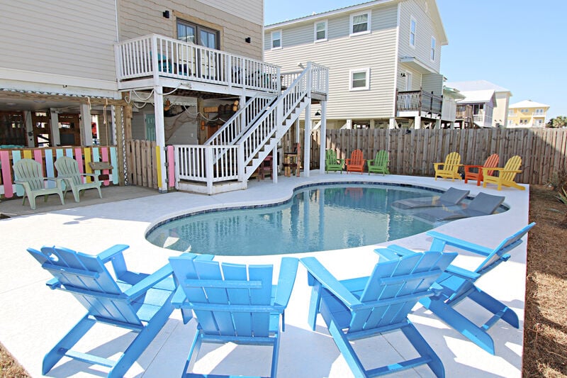 The backyard pool of one of our airbnb Gulf Shores with private pool