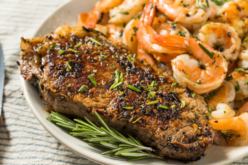A plate of steak and shrimp